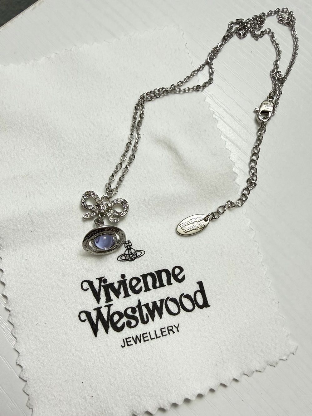 Vivienne Westwood Silver Orb Necklace with Lavender Stone and Crystal Bow